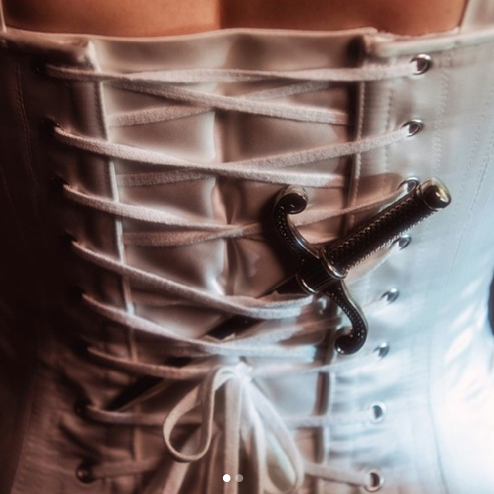 Kacey Musgraves dagger in corset